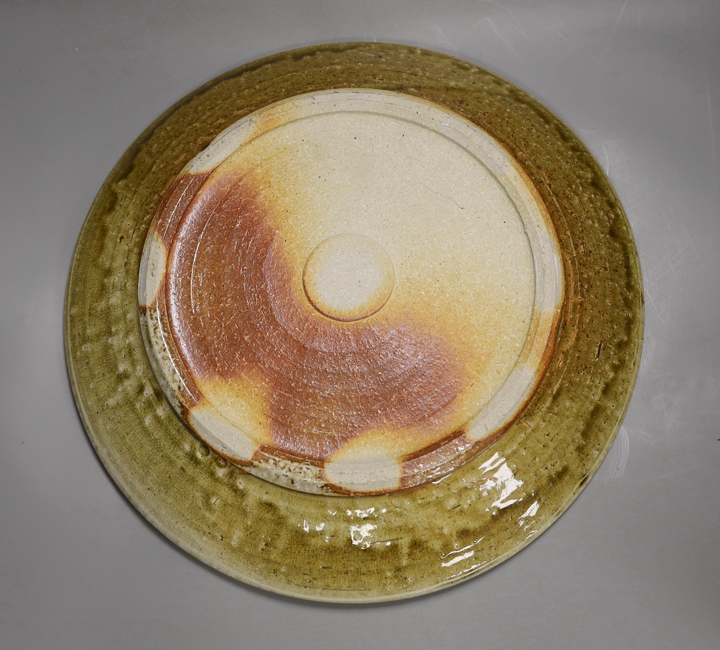 A Lisa Hammond studio pottery charger, 42cm diameter